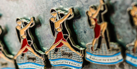 Fridge magnets with traditional tango dancers on Caminito street in La Boca neighborhood, Buenos...