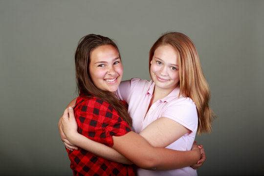 teen girls in an altercation and resolution showing tension 