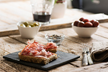 Delicious appetizer of ham and salad