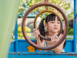 asian baby child playing on playground
