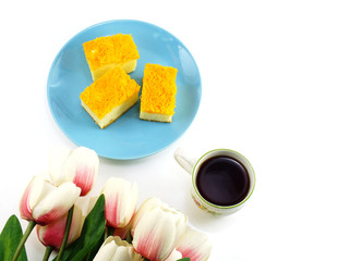 top view of morning coffee mug and cake still life