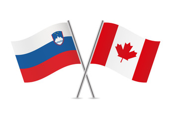 Slovenian and Canadian flags. Vector illustration.