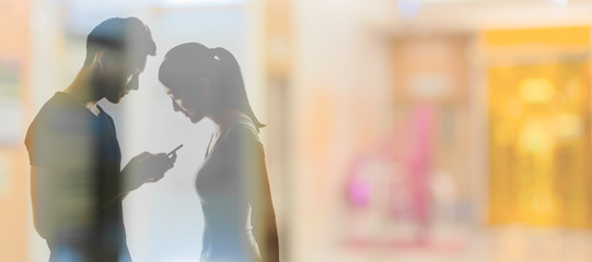 Couple using cellphone