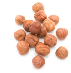 hazelnut kernels on a white background