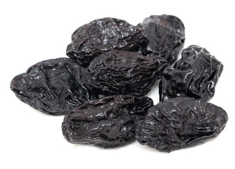 Prunes on a white background