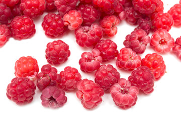 Ripe raspberry on a white background