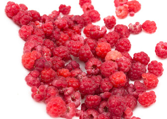 Ripe raspberry on a white background