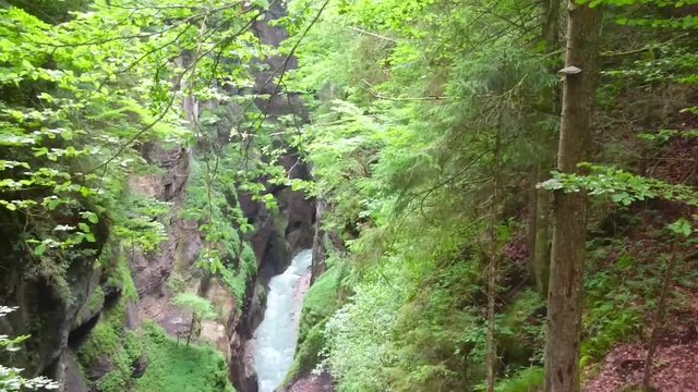 Aerial view and camera flight over rapids in Partnach Gorge or Partnachklamm is a scenic location and nature attraction in Germany near Garmisch Paterkirchen. 