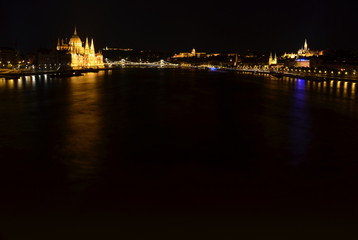 Fototapeta na wymiar Hungarian landmarks, Hungarian Parliament, Chain Bridge, Royal Palace, Citadella and Danube river in Budapest at night.