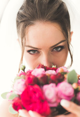 Luxury wedding bride, girl posing and smiling with bouquet