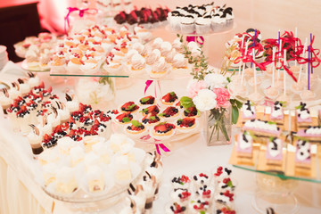 Delicious wedding reception candy bar dessert table