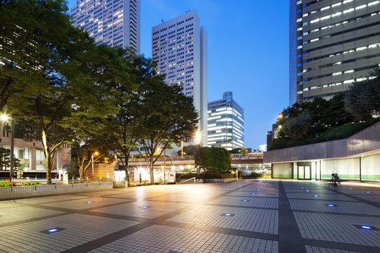 modern office buildings in downtown of tokyo at night