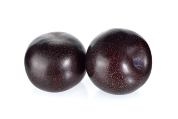 ripe black plum on white background