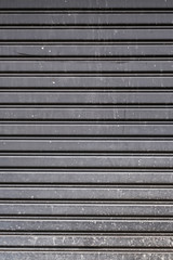 Obraz premium Old steel garage door stripped texture, horizontal lines
