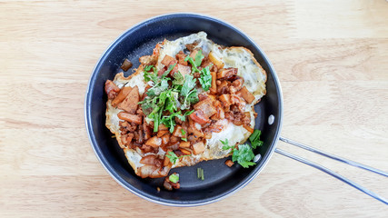 Indochina pan-fried egg with toppings in Thai style
