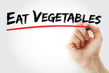 Hand writing Eat Vegetables with marker, concept background