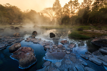 Obraz na płótnie Canvas Wonderful morning of gold steam hot spring with sunlight at Jae Son National Park,Thailand