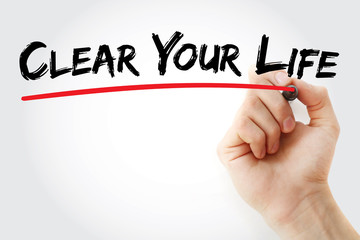 Hand writing Clear Your Life with marker, concept background