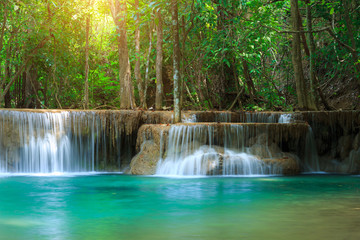 The landscape photo, Huay Mae Kamin Waterfall, beautiful waterfall in autumn forest, Kanchanaburi province, Thailand