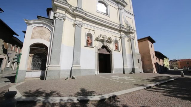 in italy vanzaghello  ancient   religion  building    for catholic and clock tower.