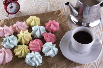 Meringue Cookies and cup of coffee.