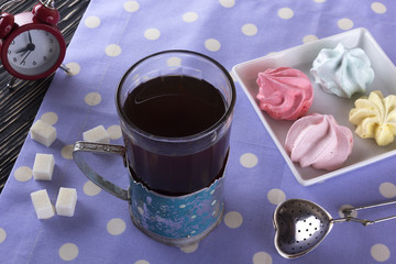Meringue Cookies and glass of tea