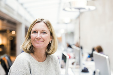 Portrait of confident businesswoman in creative office