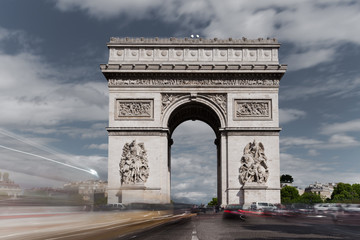 Fototapeta na wymiar Triumphal arch. Paris. France. View of Place Charles de Gaulle. Famous touristic architecture landmark in summer day. Napoleon victory monument. Symbol of french glory. World historical heritage.