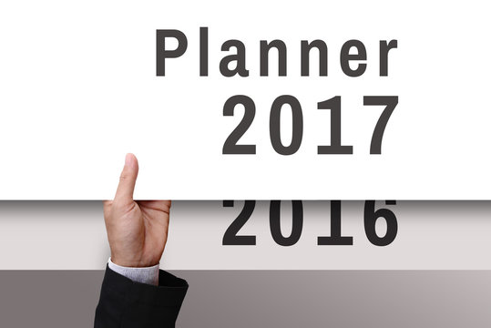 Businessman hand with banner Planner 2017