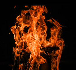 raging flames red fire black background