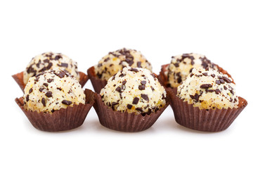 Homemade vegetarian truffle candies isolated on white background