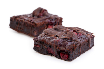 Delicious vegetarian brownie with cherries isolated on white bac