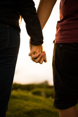 Man and woman hands together