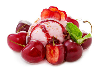 Ice cream and fresh red cherries.