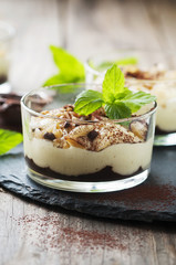 Sweet homemade dessert with cream and chocolate