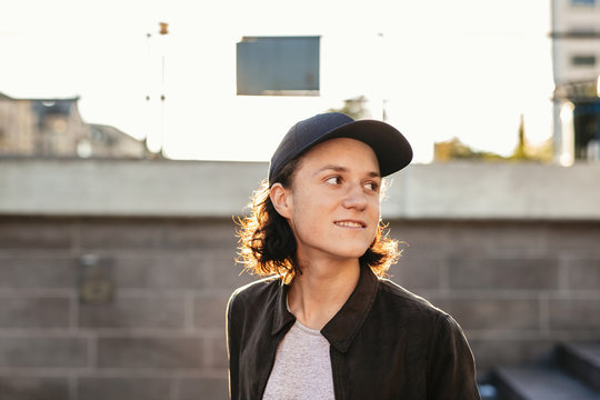 Teenage Girl Wearing Baseball Cap Outdoors