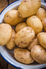 young potatoes in rustic bowl