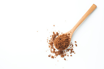 brown sugar with wooden spoon on white background