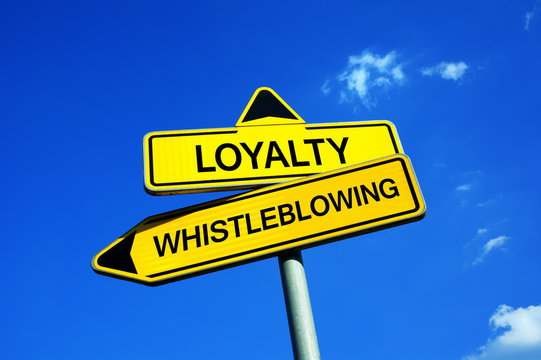 Loyalty or Whistleblowing - Traffic sign with two options - Appeal to expose illegal, unethical and not correct activities because of public good 