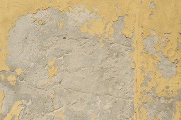 Wall fragment with scratches and cracks