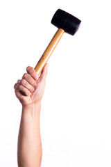 
hand holding a rubber hammer on a white background