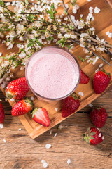 Fresh milk, strawberry,drink on wooden table, assorted protein cocktail with fresh fruits. 