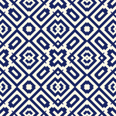 Seamless pattern with symmetric geometric ornament. Navy color abstract background.