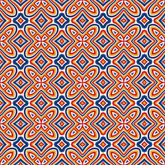 Bright ethnic abstract background. Seamless pattern with symmetric geometric ornament.