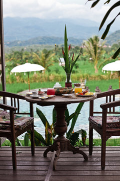 Healthy yummy breakfast with a beautiful view in hotel. Bali resort. Morning mood