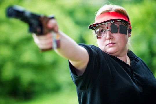 Pistol sport shooting woman