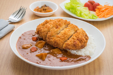 Crispy fried pork cutlet with curry and rice, Japanese food style