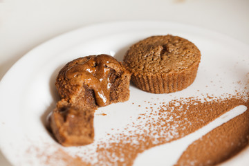 Freshly Baked Muffins On A White Plate