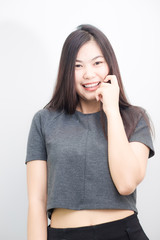 Asian smilling sexy women relax in white room condominium