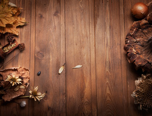 autumn background with fruits and spices with dried flowers place for inscription